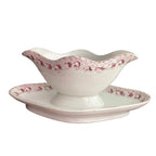 Antique French St. Amand porcelain sauce boat with red leaf design. Elegant Belle Époque tableware with timeless French charm.