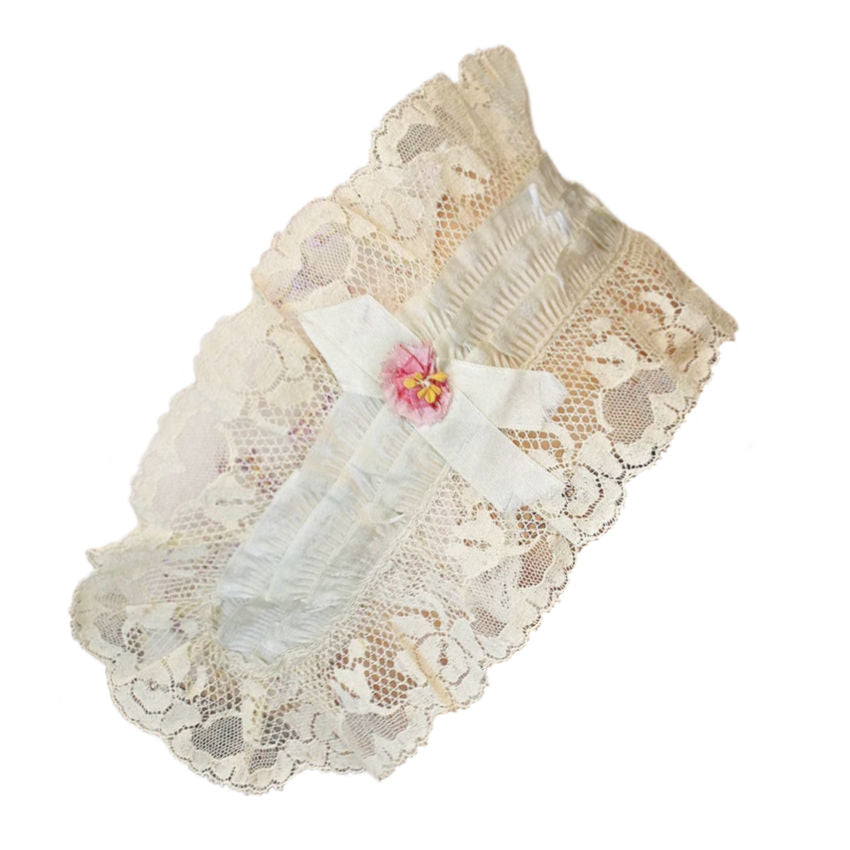 Antique French silk lace ribbon work rose with blue ruffled ribbons and a pink flower, tied with silk ribbon ties.