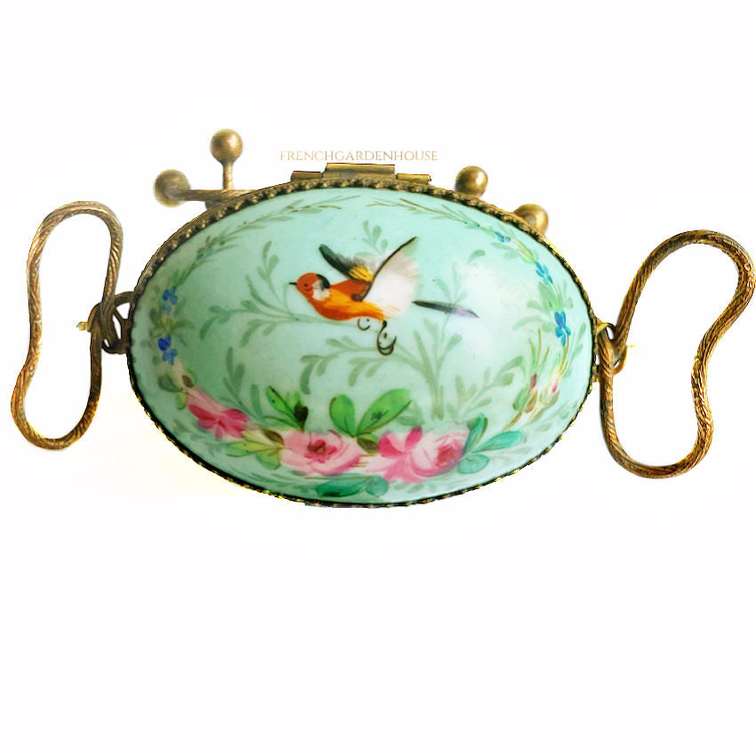 Antique French Palais Royal porcelain egg-shaped casket with gilt ormolu mounts. A rare 19th century objet de vertu of refined Parisian luxury.