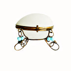 Antique French Palais Royal opaline glass egg box with subtle blue accents, Napoleon III, 19th century, gilt bronze stand, Grand Tour collectible.
