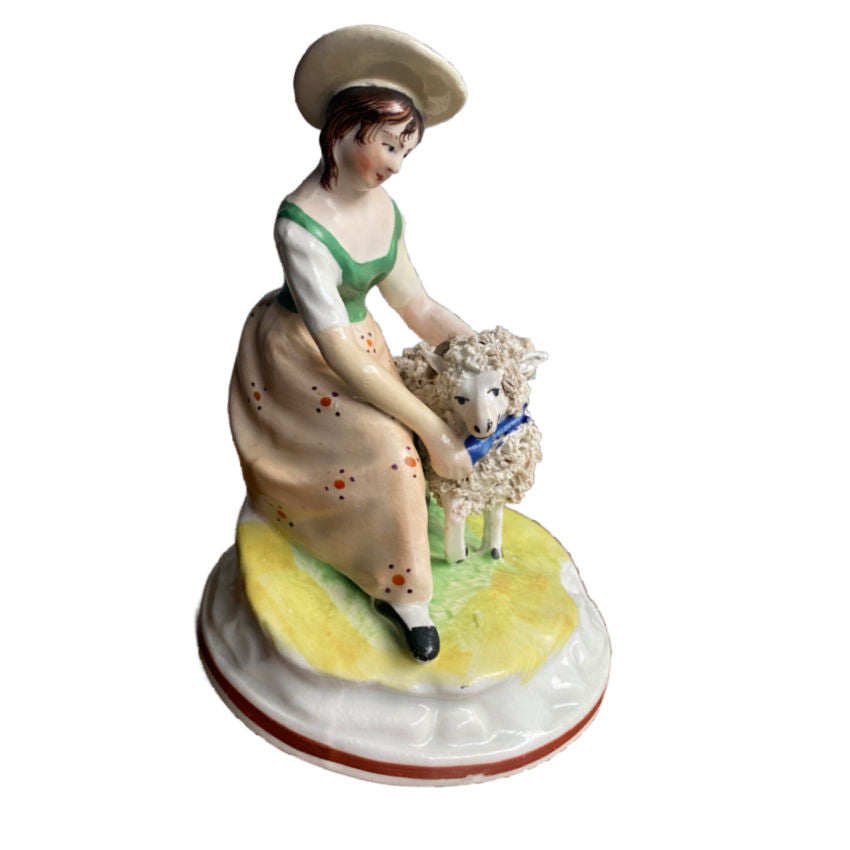 antique staffordshire figure with sheep