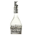 Antique Sterling Silver Repousse Cherub Overlay Etched Crystal Decanter with a floral etching and a figurine of a cherub on the top, featuring a lush garden scene.