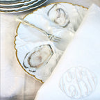 Elegant Art Deco style oyster plate, from Belgian family estate with monogrammed napkin, oyster fork and oysters.