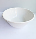Vintage ironstone bowl with warm patina, the kind that anchors a kitchen with simple, lasting character