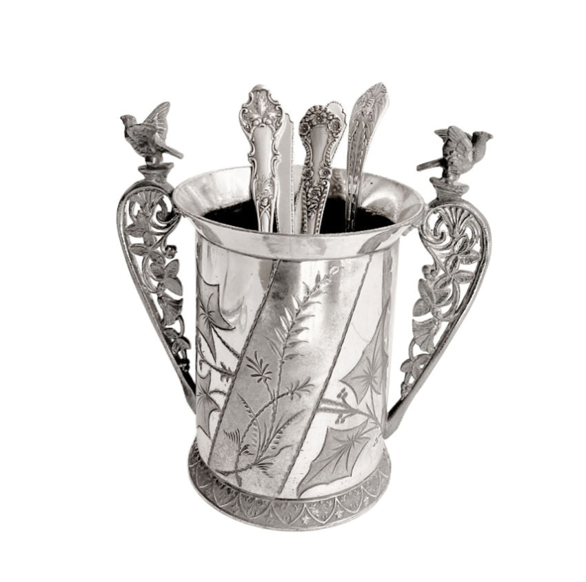 Victorian silver, antique silver plate, Aurora Silver Plate Co, antique spooner, bird motif, Victorian tableware, American antique silver, 19th century silver, decorative arts, nature inspired design, collectible silver, antique dining decor, Victorian decor, silver bird handles, French Garden House style, engraved silver, antique serving piece, silver collector, antique table accessory, botanical engraving