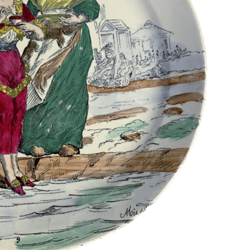 Close-up of polychrome decoration and fine hand painted detailing on antique faience plate