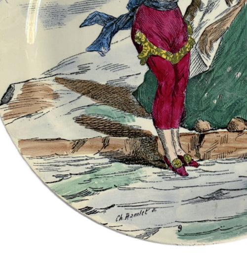 Close-up of signature on polychrome decoration and fine hand painted detailing on antique faience plate