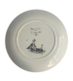 Reverse of antique 19th century French faience plate showing glaze and Creil Montereau mark of sail boat