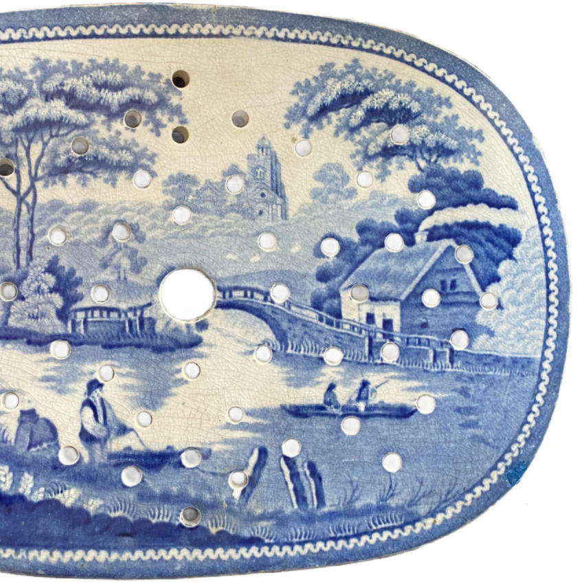 Early 1800s Nuneham Courtenay meat drainer, antique kitchenware, close-up of cobalt design right side