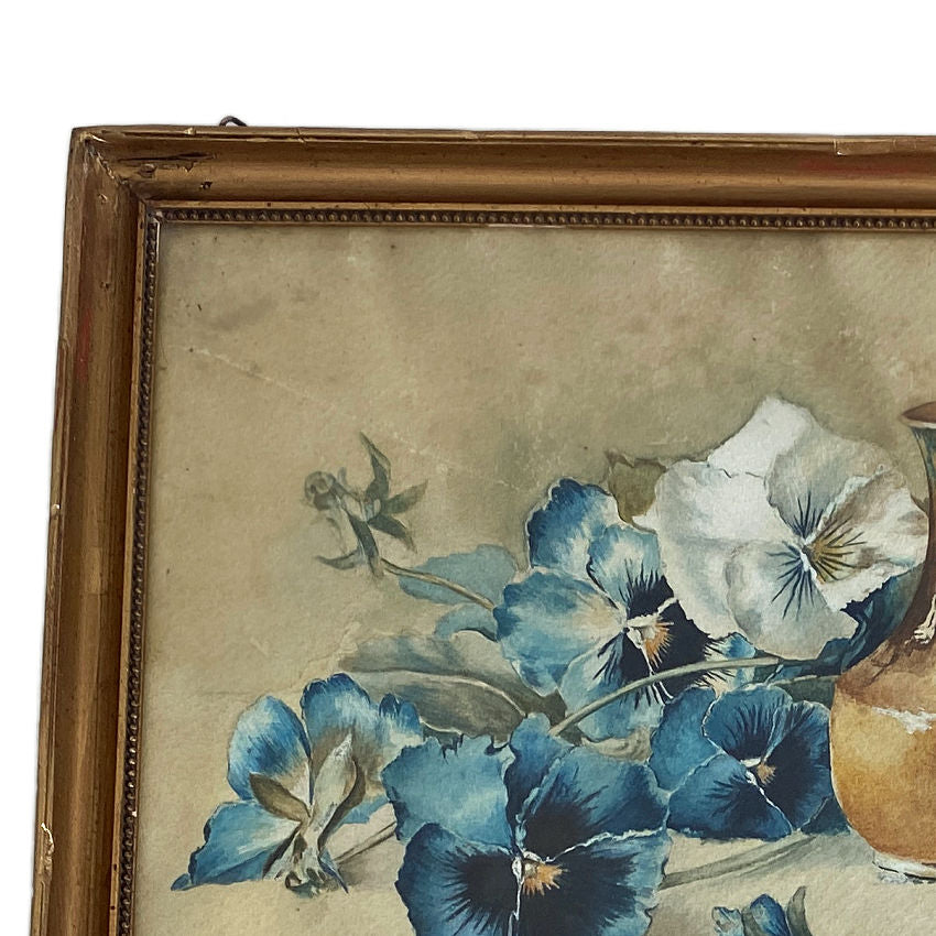 Antique French watercolor dated 1921, featuring a poetic bouquet of blue and white pansies, beautifully painted and presented in its original restored gilt frame.