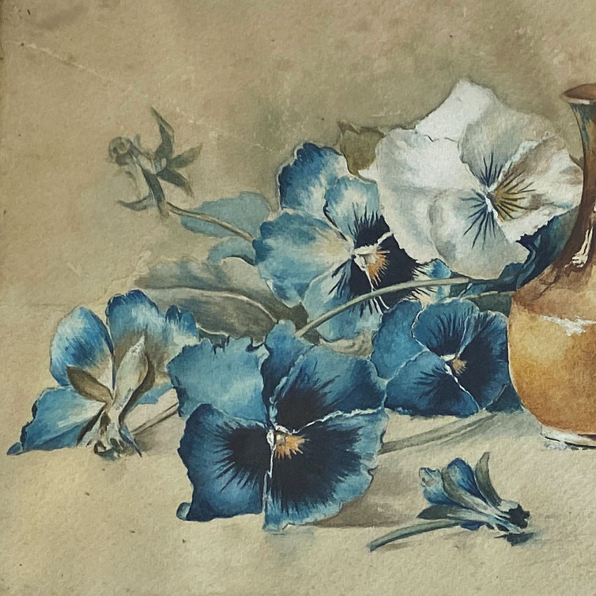 Antique French watercolor dated 1921, featuring a poetic bouquet of blue and white pansies, beautifully painted and presented in its original restored gilt frame.