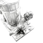 Detail of expressive figural casting and soft silver patina