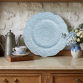Antique French barbotine floral plate blue glaze in French Country buffet with hydrangeas