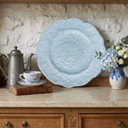 Antique French barbotine floral plate blue glaze in French Country buffet with hydrangeas