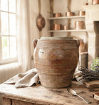 antique French confit pot, brown glazed French pottery, antique French country kitchen decor styled on a table with copper pots, lavender and hydrangeas