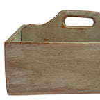 Close-up of antique French Country wooden work box with mellow green painted surface and aged patina