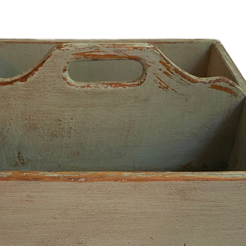 Detail of early 20th century European tote showing worn edges and original layered paint