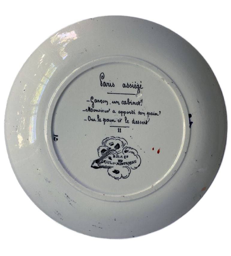 Back signed view antique French assiette parlantes" {talking plate} with elegantly dressed couple and satirical food scarcity scene, rich in historical charm.