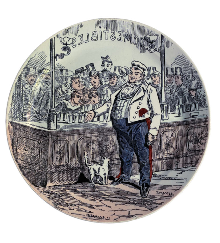 Front view of 19th-century Creil-Montereau faience plate showing interior shop scene with a cat and crowds peering at the window display from outside.