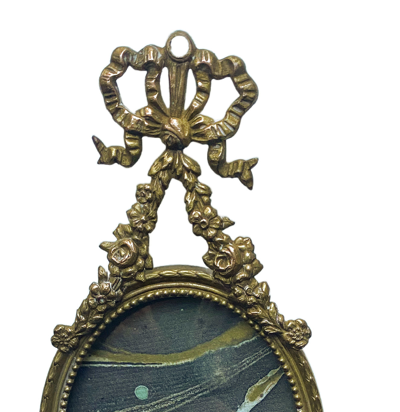 Antique French Empire style hanging picture frame with ornate decorative elements, featuring a convex glass cover.