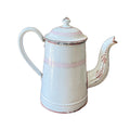 Antique French enamelware cafetière in white and pink with classic form, soft patina, and charming hand-painted details.