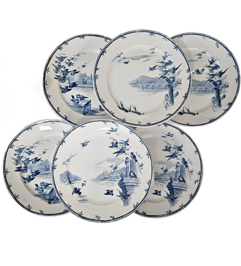 Antique Gien “Oiseaux et Bourgeois” blue transferware plates, set of six 9¼". 19th century French faience with birds and architectural scenes.