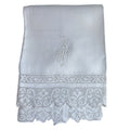 Antique French hand-embroidered towel with crowned lion monogram and lace trim—noble 19th-century linen with exquisite detail and timeless elegance.