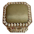 Top view of antique French shellwork souvenir box with green silk
