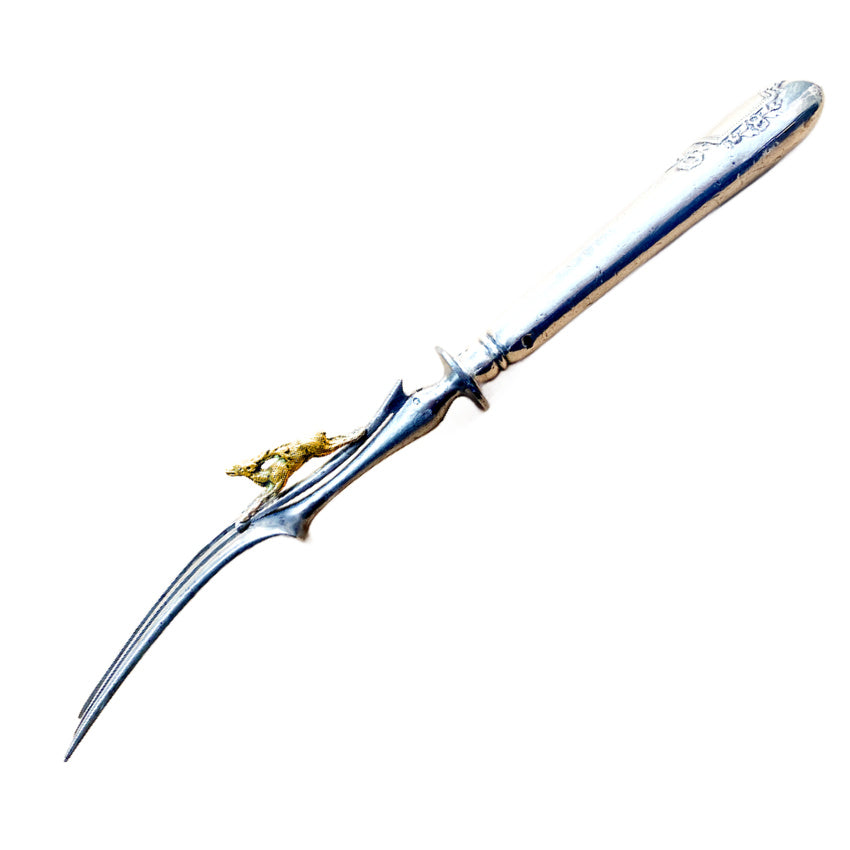 Antique French sterling silver meat serving fork with gilt stag and bow handle