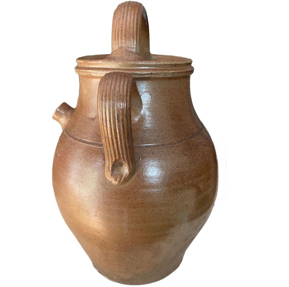 Detail of glaze and patina on antique French terracotta water or oil jar handle detail