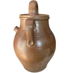 Detail of glaze and patina on antique French terracotta water or oil jar handle detail