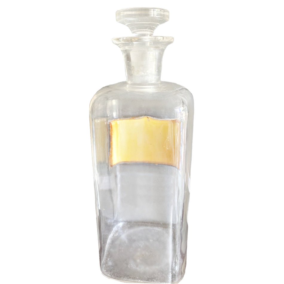 Antique apothecary bottle with aged glass and collector character