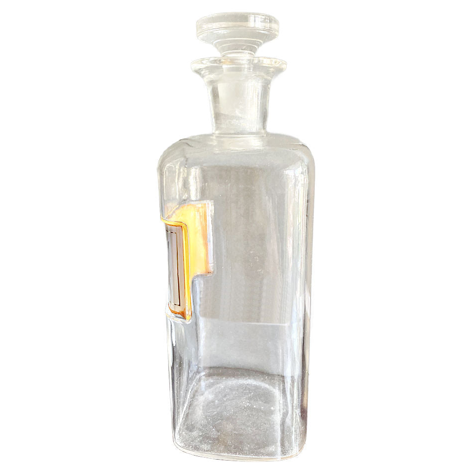 Antique glass medicine bottle decorative object for a collected home side view