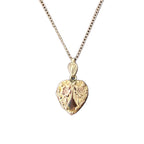 Antique gold-filled heart locket with forget-me-not flowers