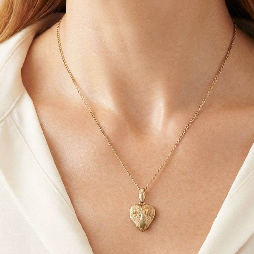Antique gold-filled heart locket to wear layered with necklaces