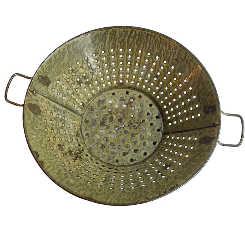 Antique green enameled country colander, rustic charm, collectible home accent, gently worn, striking decorative piece for kitchen or display.