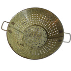 Antique green enameled country colander, rustic charm, collectible home accent, gently worn, striking decorative piece for kitchen or display.