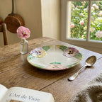 Antique Hautin Boulenger & Cie pansy plate pink purple floral majolica decor in French setting with garden window
