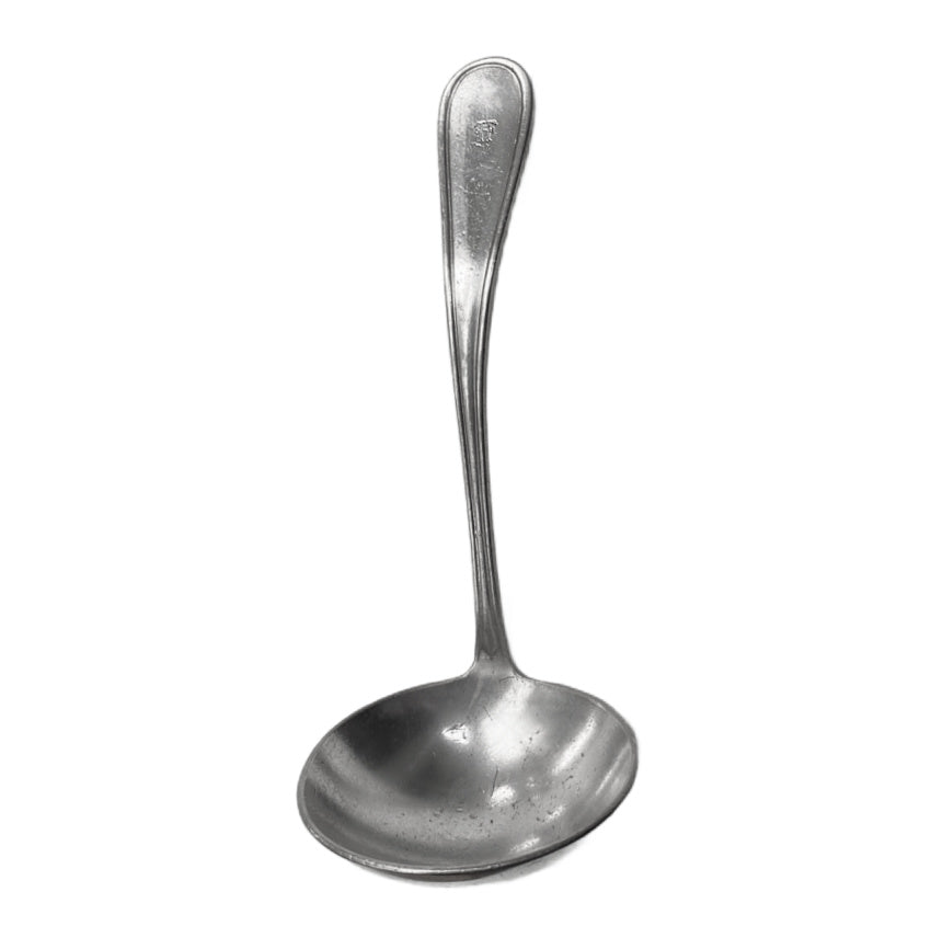 Antique Hotel Fontenelle silver gravy ladle with rich patina and classic hotel weight—an elegant, collectible piece of historic American hotel silver.