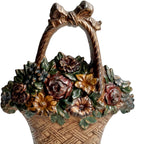 Close-up of antique Hubley doorstop painted surface and gold bow