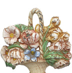Antique Hubley floral basket doorstop No. 484, soft pastels, gentle wear, Victorian charm, collectible cast iron accent, perfect for elegant interiors.