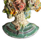Early 20th century Hubley doorstop painted flower basket design