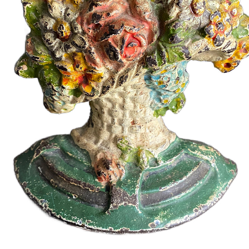 Early 20th century Hubley doorstop painted flower basket design