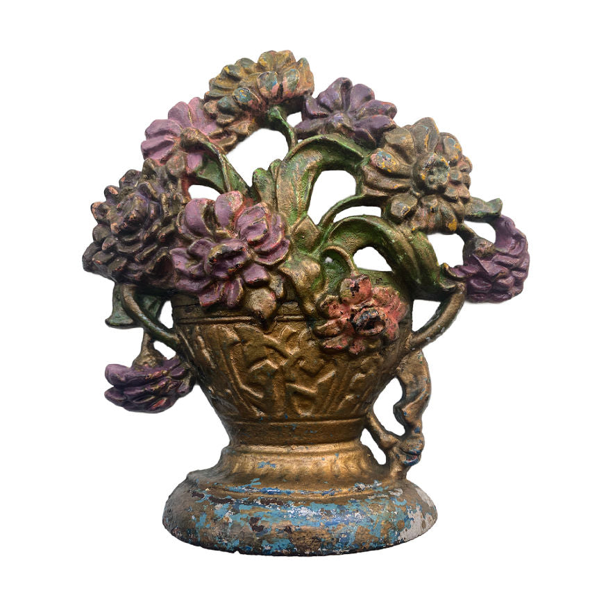 Collectible Antique Hubley zinnia doorstop with plum and gold painted finish