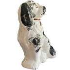 Antique black and white Staffordshire style dog figure side view