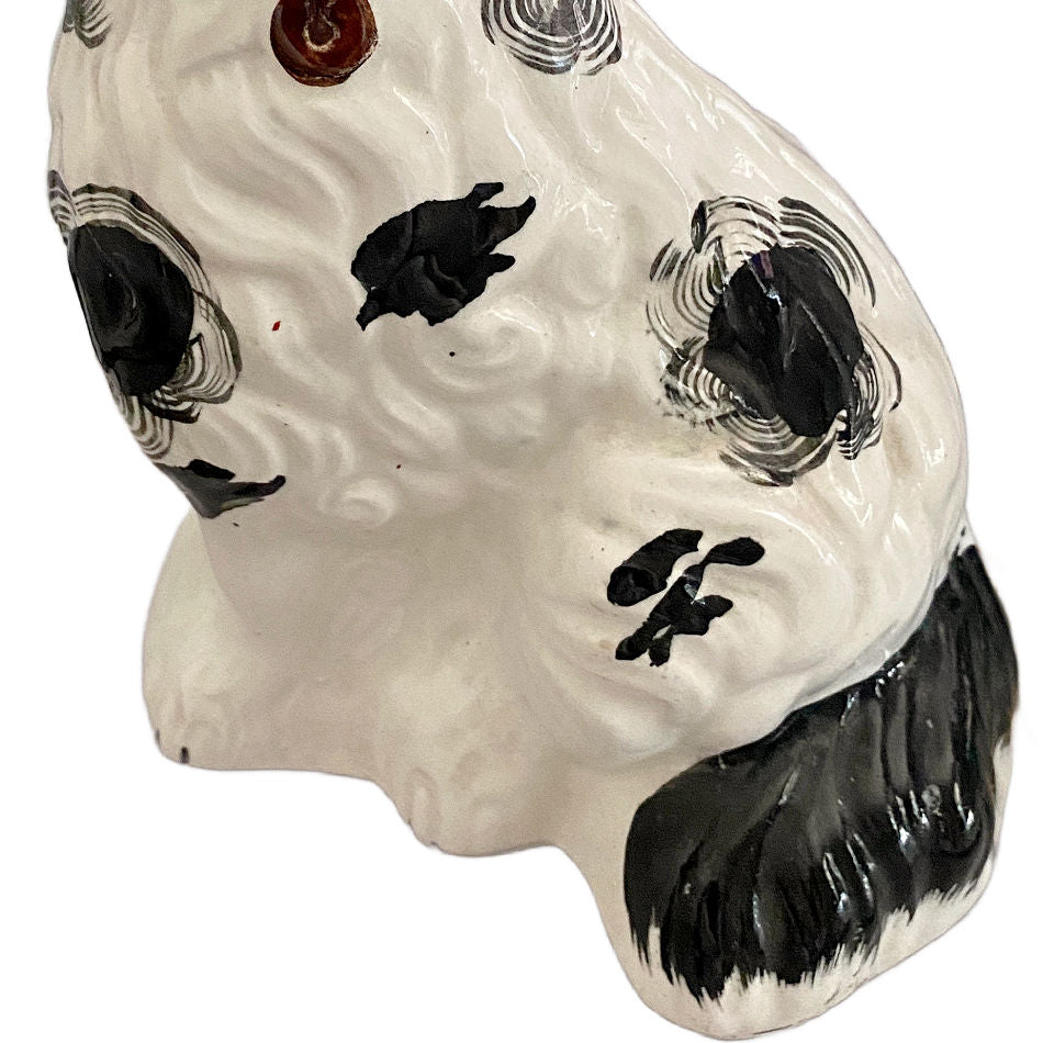 Late 19th century English pottery sitting spaniel tail