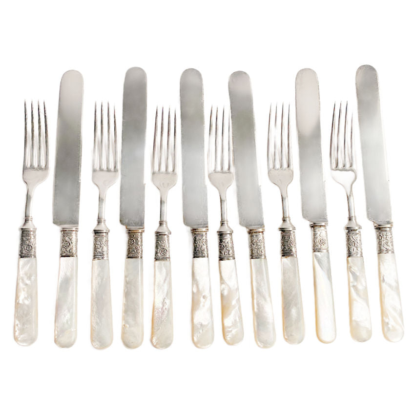 Luxurious Antique Mother of Pearl Dinner Flatware for 6 with sterling ferrules. Elegant knives and forks, glowing MOP handles, heirloom 19th-century set.