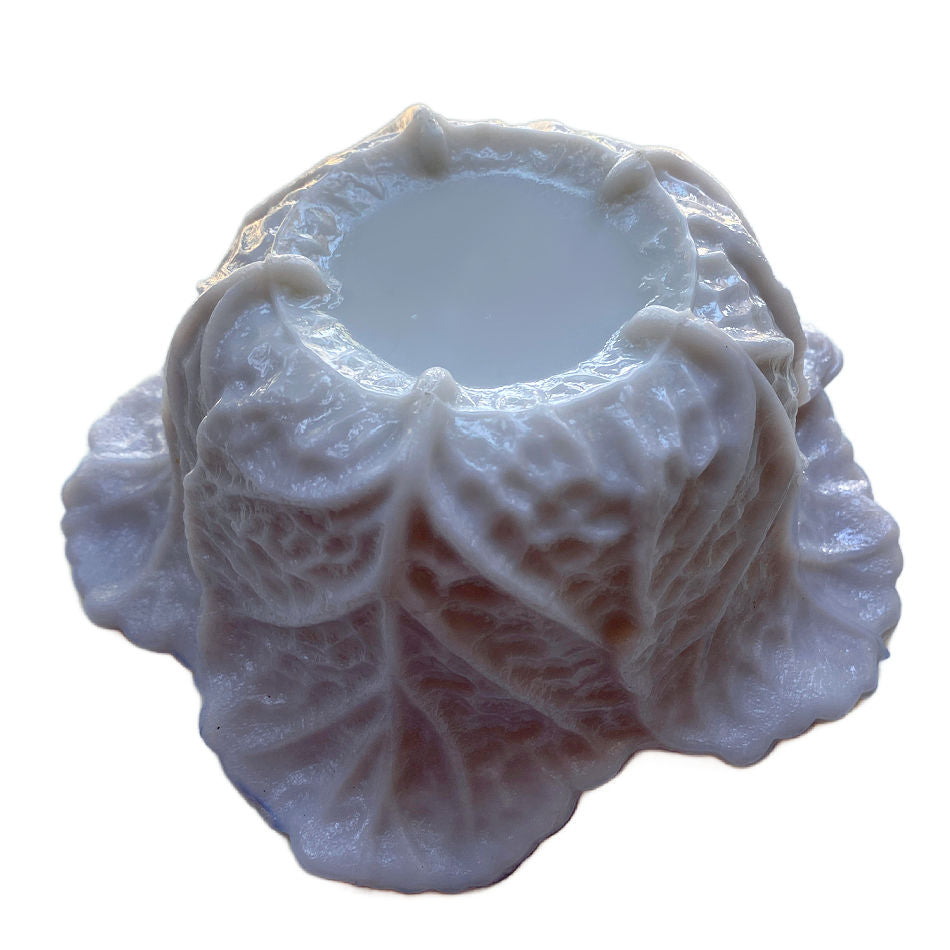 Bottom view of lilac opaline cabbage bowl highlighting sculpted cabbage leaf form and luminous glass finish
