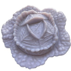 Close-up view of antique Portieux Vallerysthal cabbage bowl showing detailed leaf design and soft opaline color