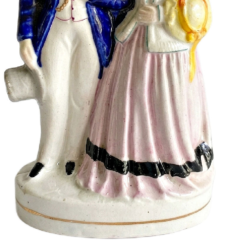 staffordshire figure with historic charm and soft patina on bottom base